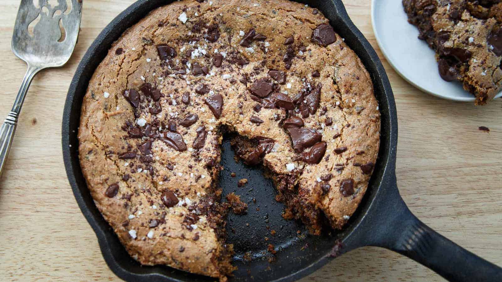 Chocolate chip cookie skillet in a cast iron pan.