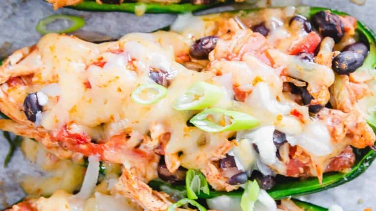 Mexican stuffed peppers on a baking sheet.