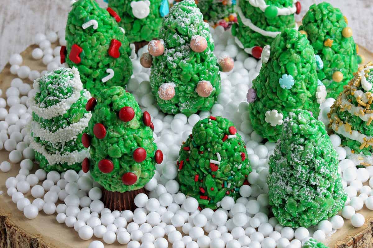 Rice Krispie Christmas tree treats on a platter.