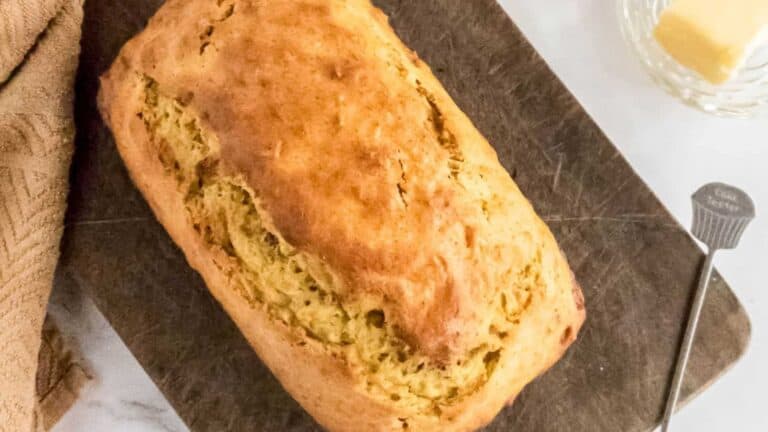 A loaf of bread on a cutting board.