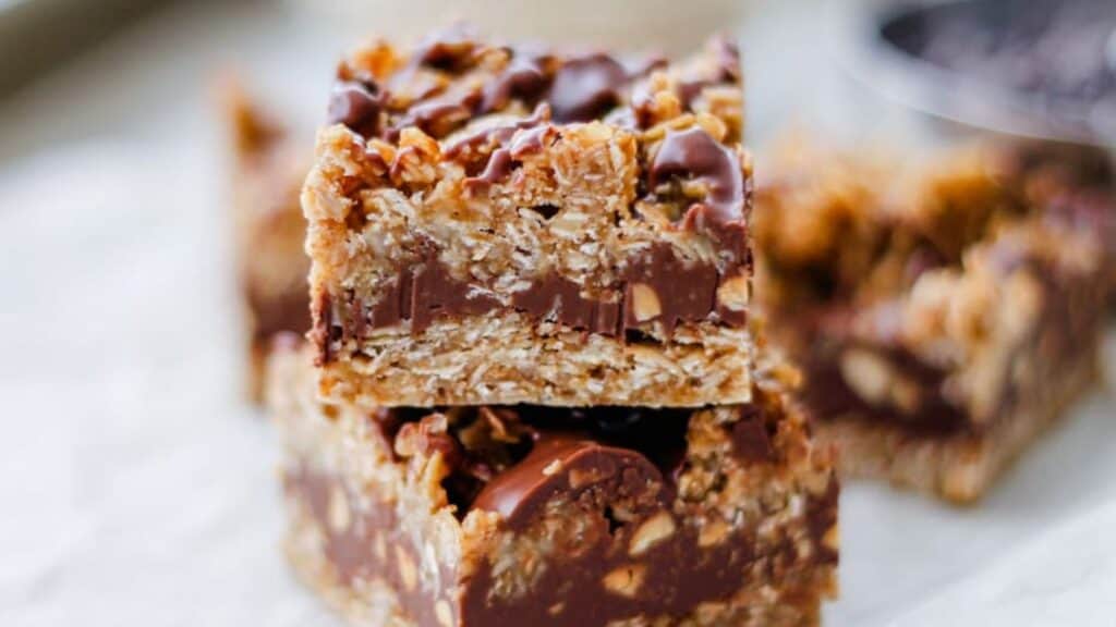 A stack of chocolate granola bars stacked on top of each other.