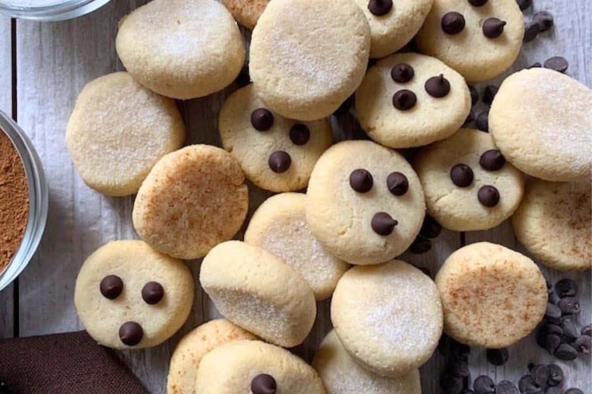 A group of cookies with chocolate chips on them.
