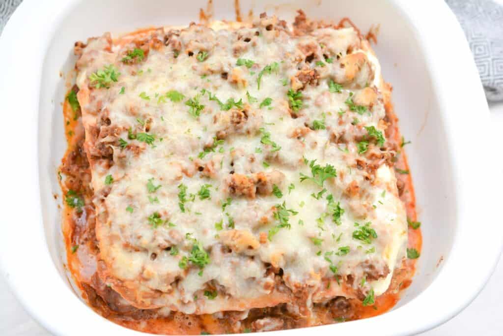 A casserole dish filled with meat and cheese.