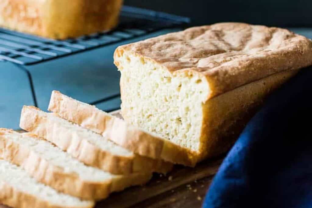 A loaf of bread on a cutting board.