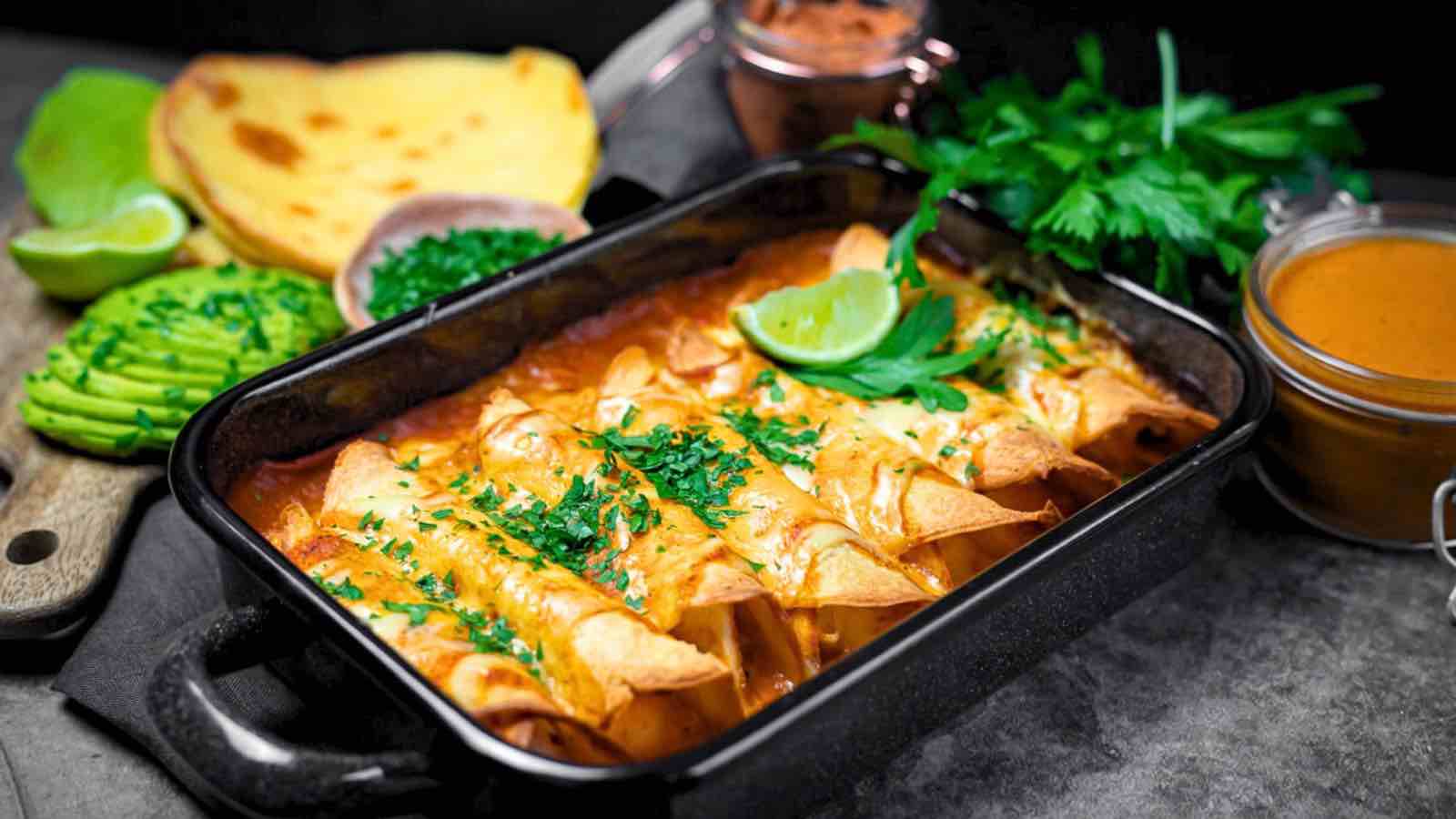 Mexican enchiladas in a baking dish.