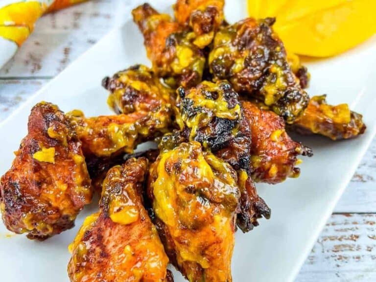 A plate of grilled mango chipotle wings.