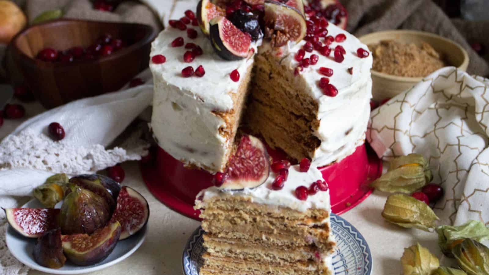 Classic Desserts: A delightful slice of cake adorned with succulent figs and tart cranberries.