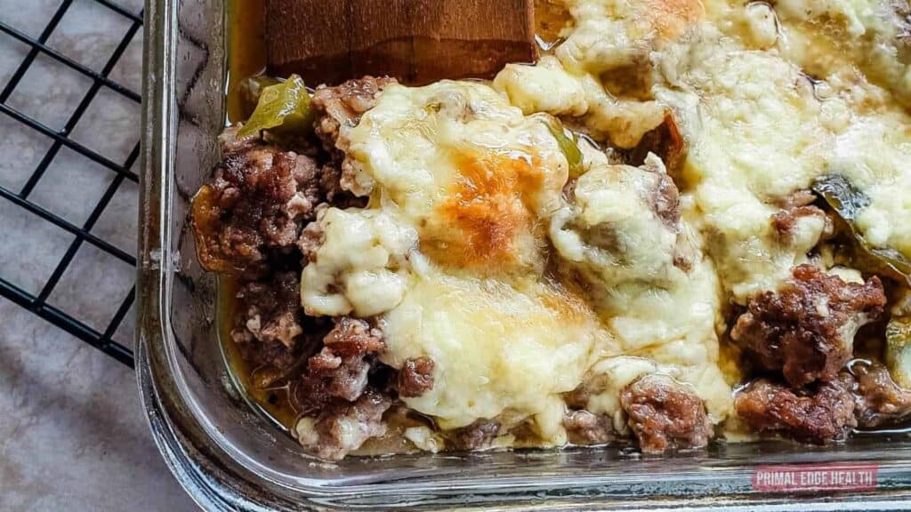 A casserole dish filled with meat and cheese.