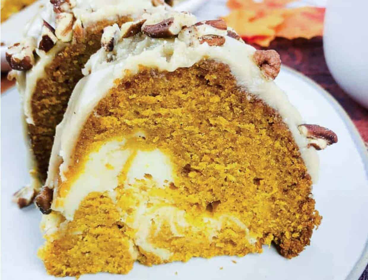 A pumpkin bundt cake served on a plate.