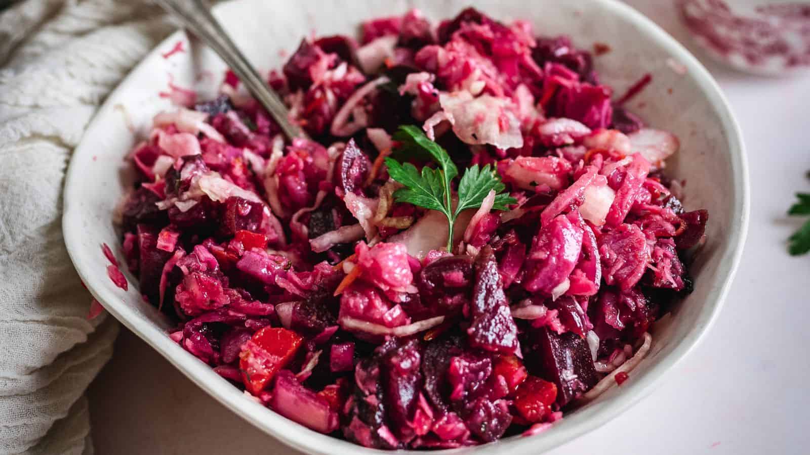 A bowl of food with a spoon.