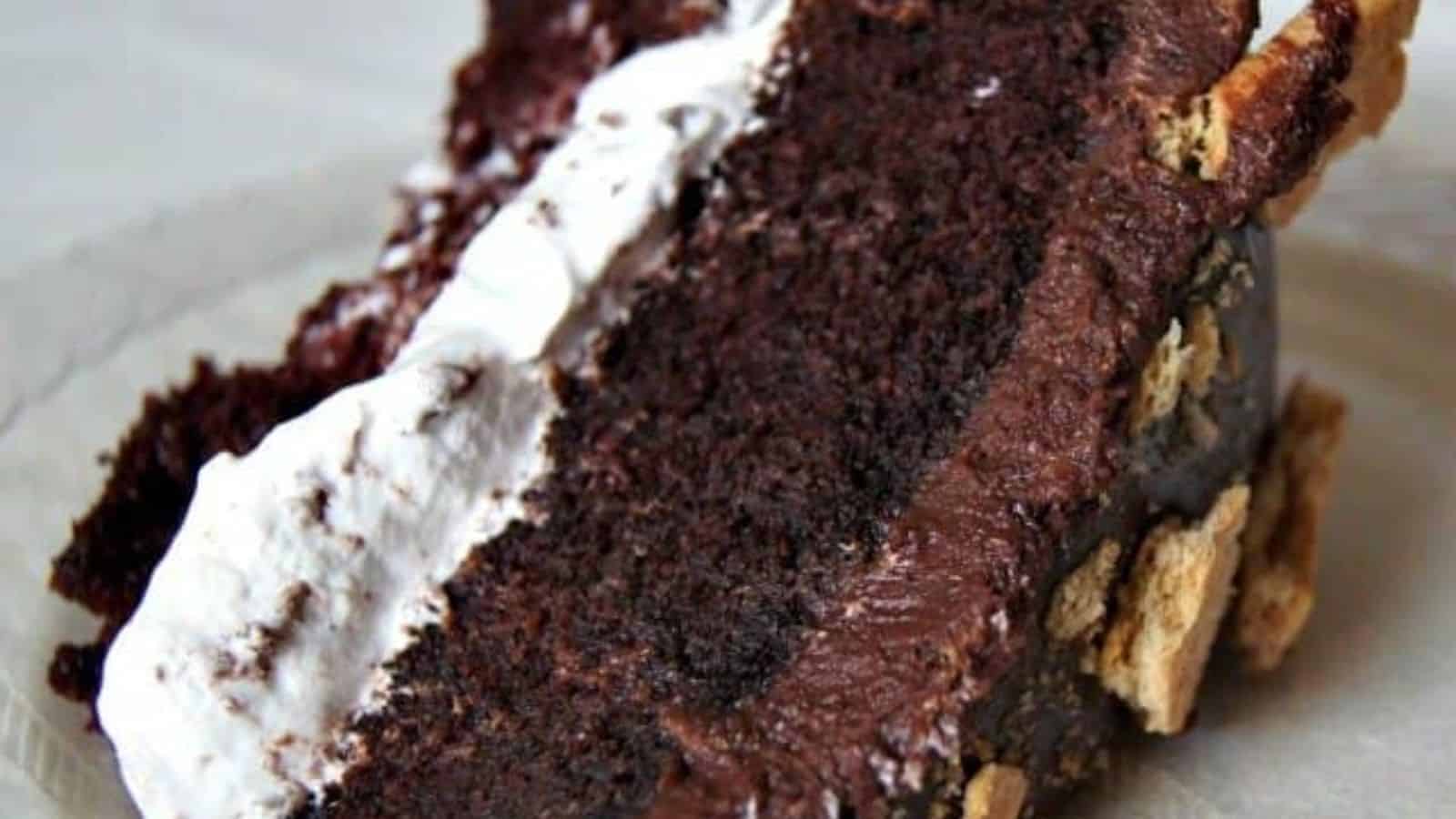 Image shows a Slice of smores cake on its side.