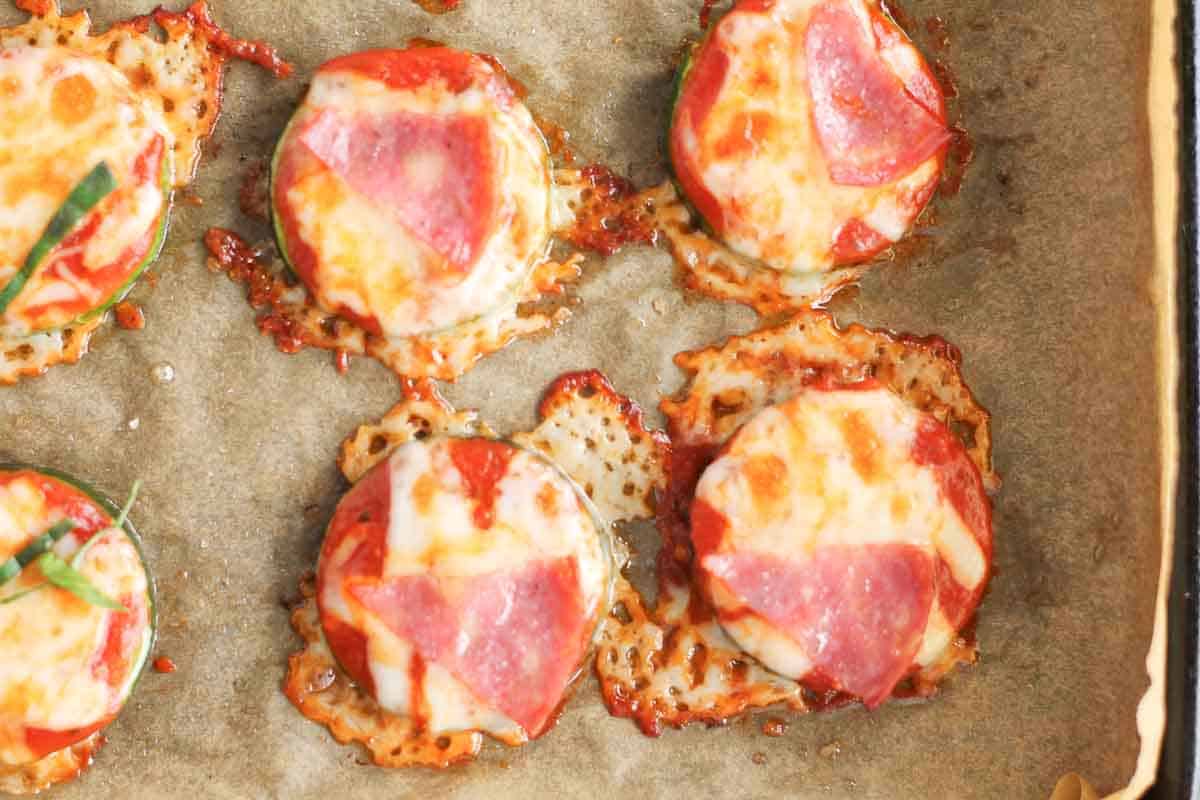 An overhead image of Zucchini Pizza Bites on a baking tray.