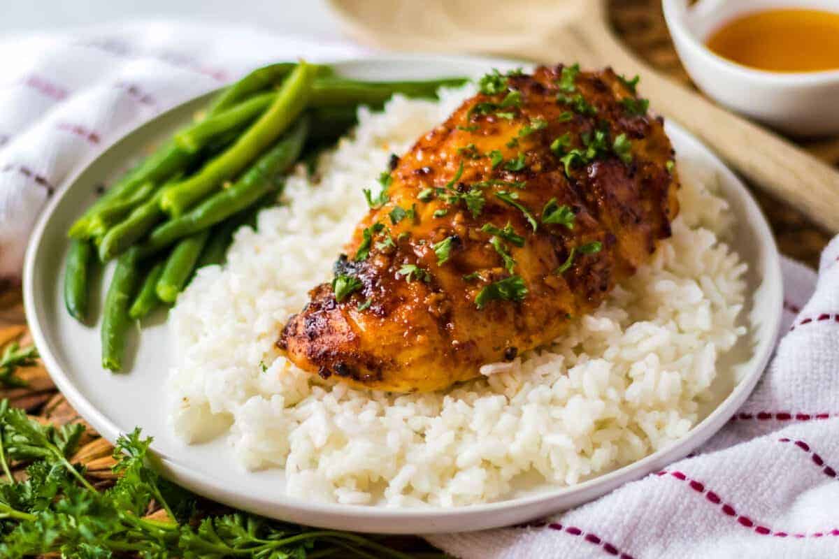 Hot honey chicken on a bed of rice.