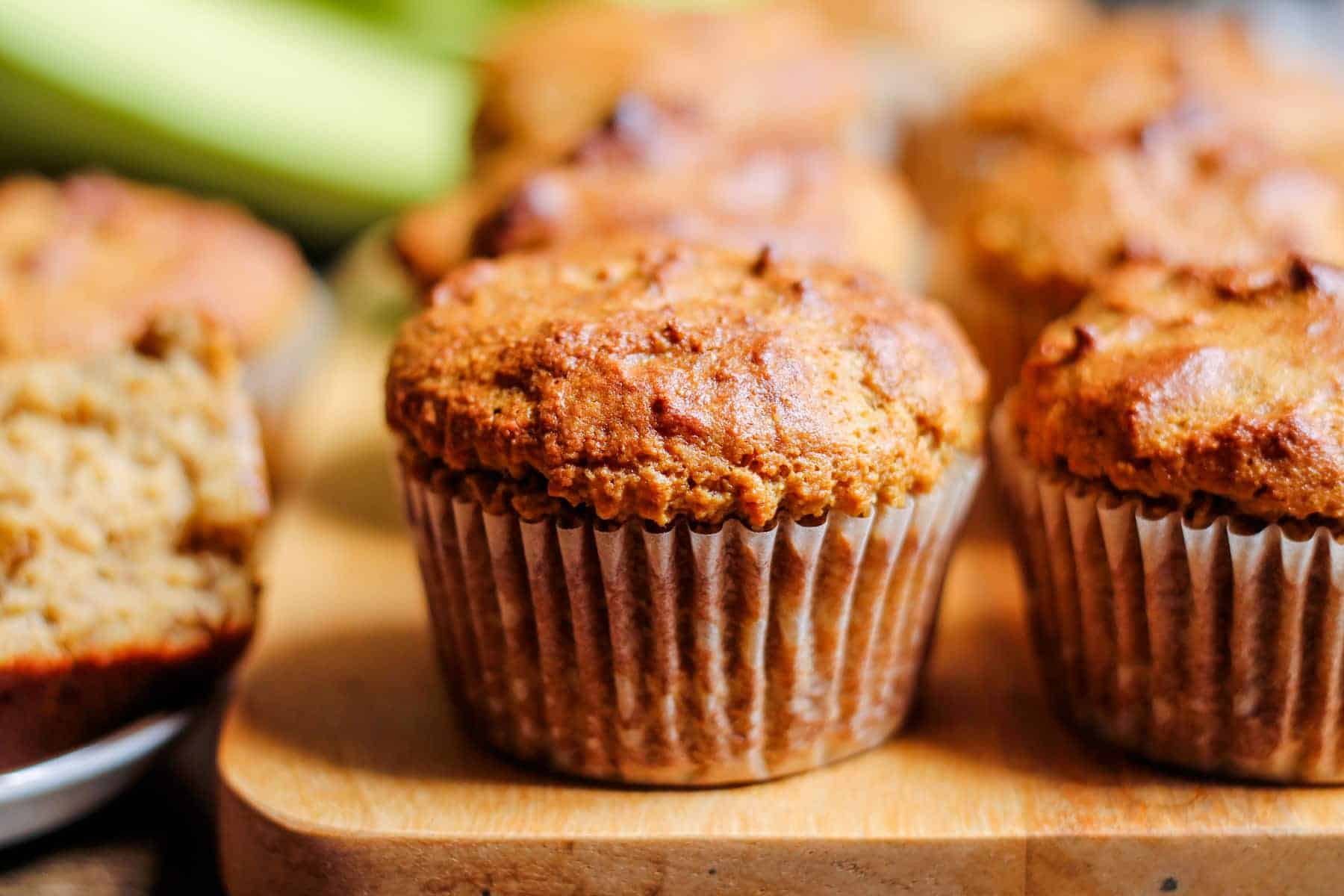 A batch of banana protein muffins on a counter.