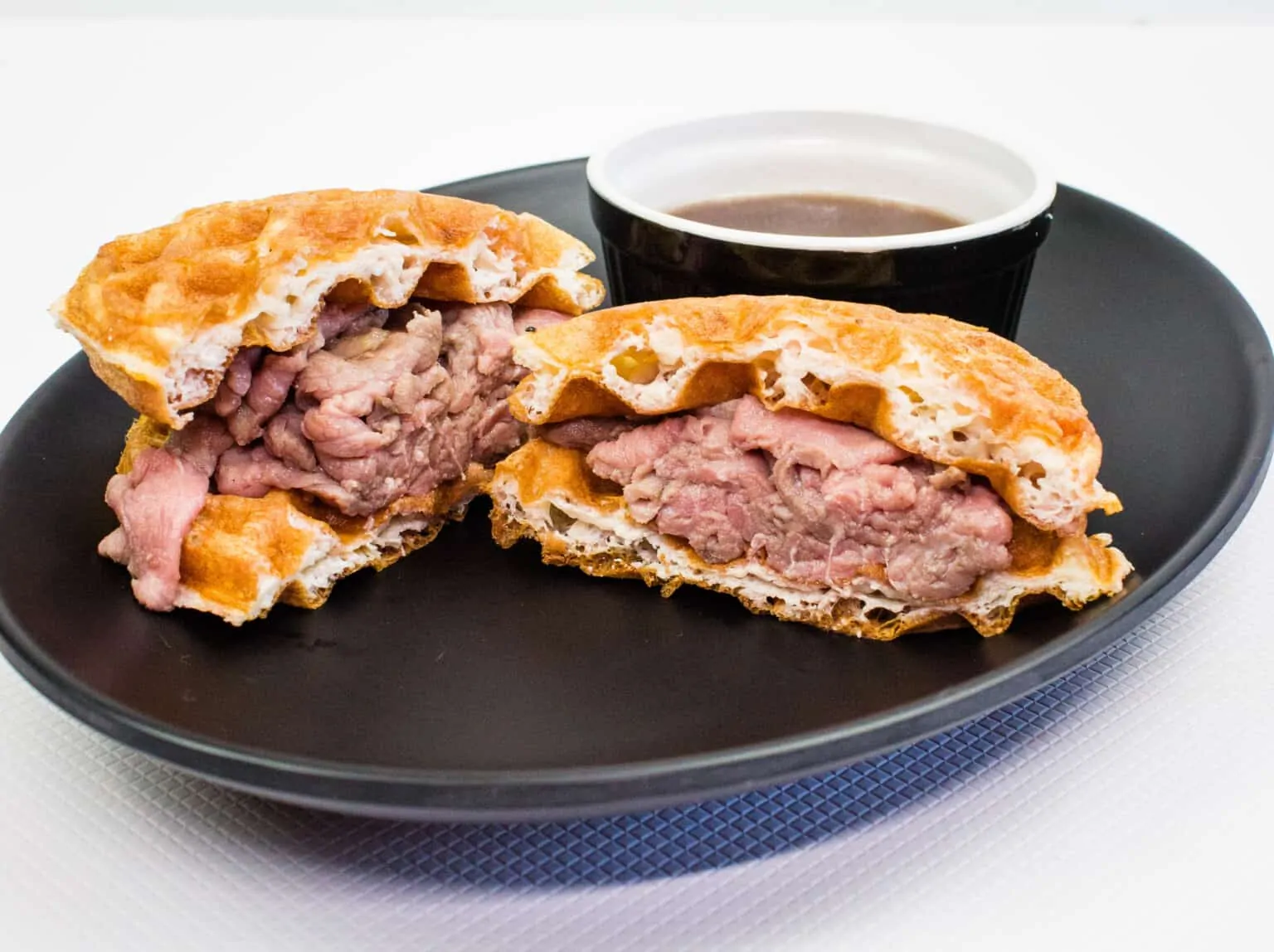 French Dip Chaffle Sandwich on a plate.