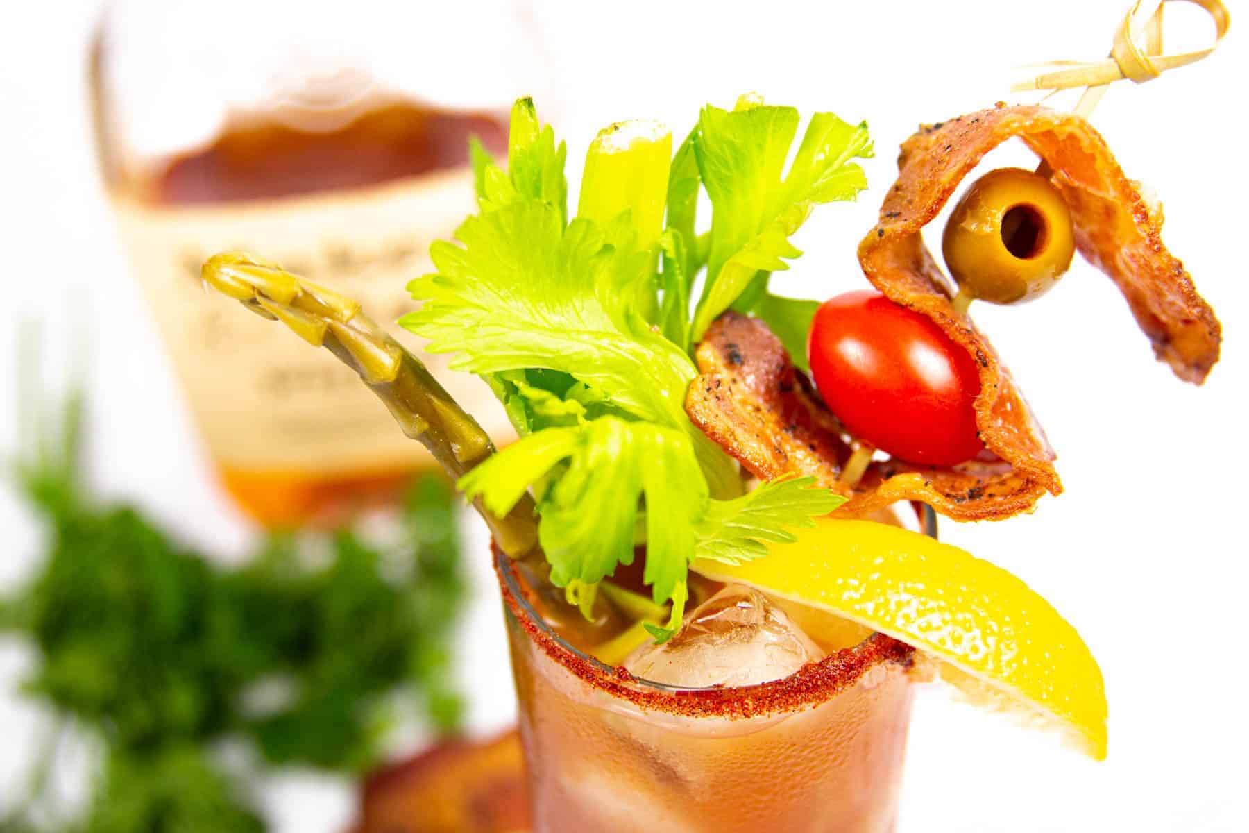 Closeup of garnishes on a Bloody Mary.