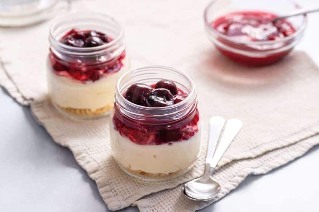 Cherry cheesecake in jars.