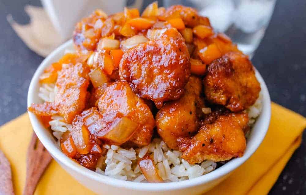 A bowl of healthy sweet and sour chicken.