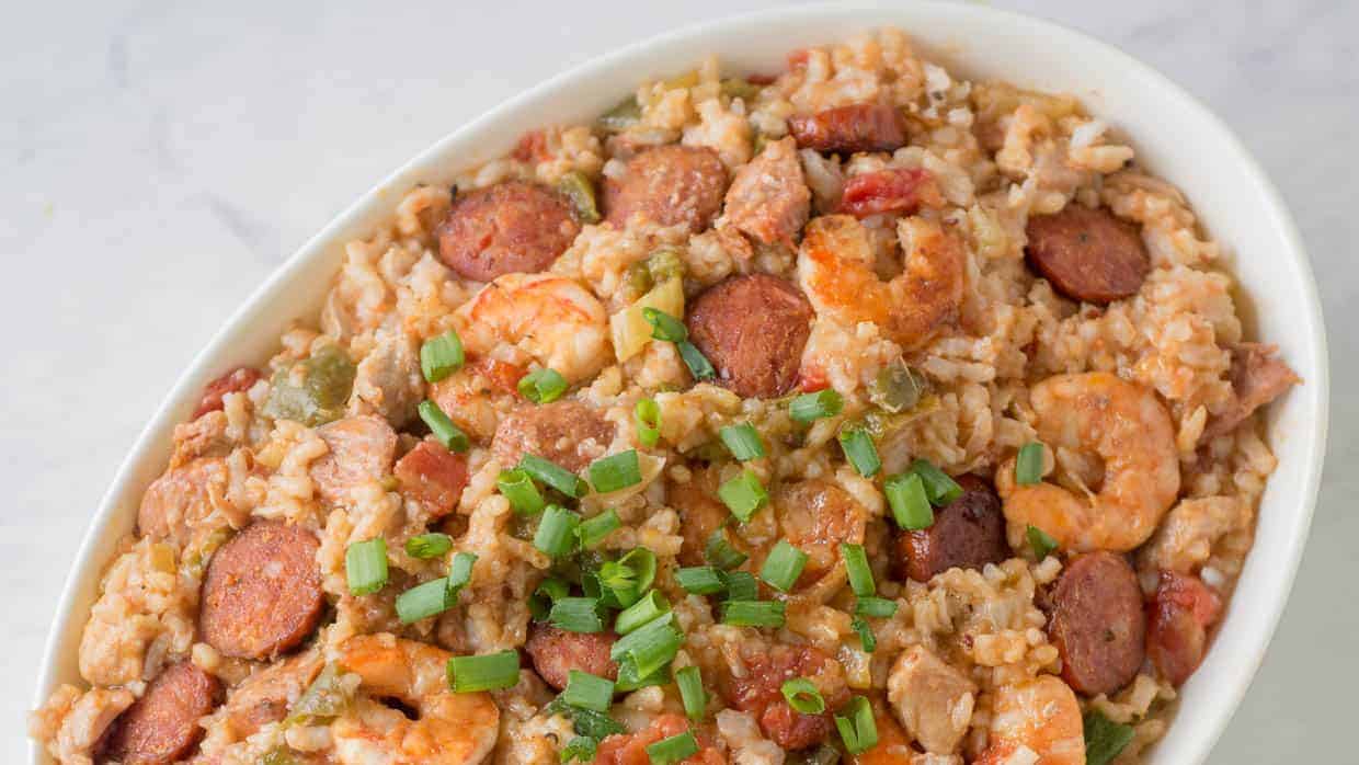 Top view of Instant Pot jambalaya in a white bowl with shrimp and sausage.