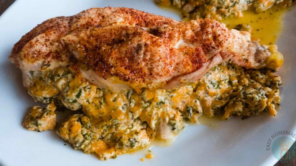 A plate with copycat chicken and cheese recipe.