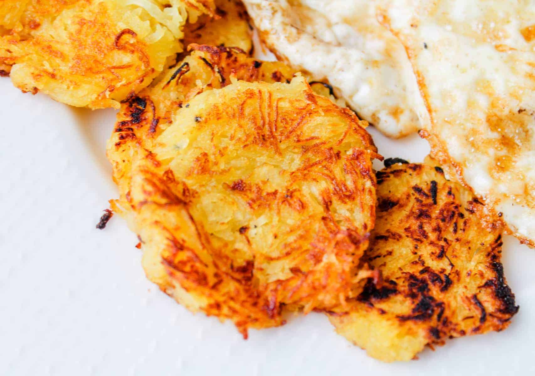 Overhead image of a plate of Spaghetti Squash Hashbrowns.