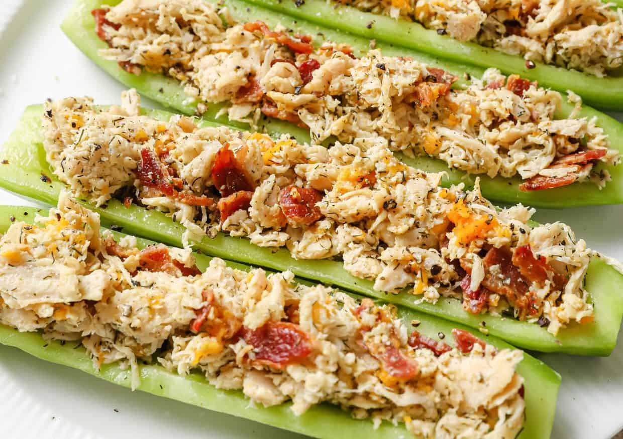 https://tastesdelicious.com/wp-content/uploads/2024/02/Bacon-Ranch-Chicken-Salad-Cucumber-Boats-1.jpg