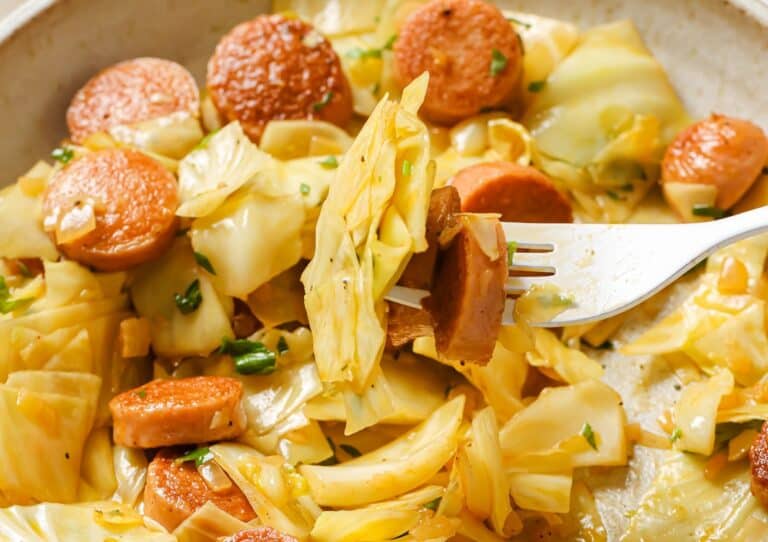 A fork in a bowl of food.