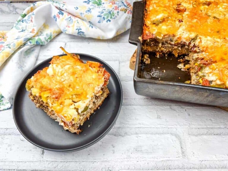 A slice of beefy John Wayne casserole on a plate.