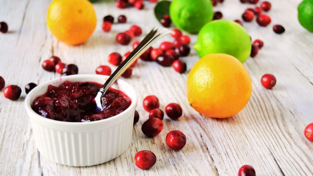 Orange cranberry sauce with oranges and lemons.