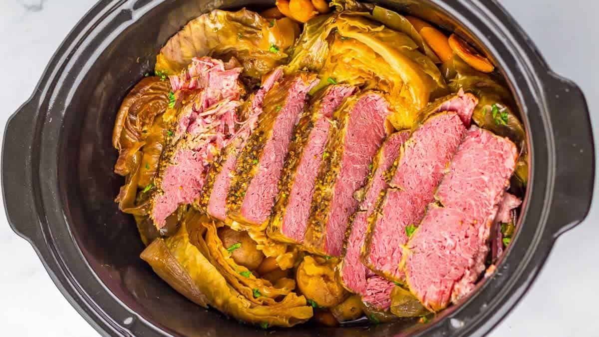 Corned beef and cabbage in a slow cooker.