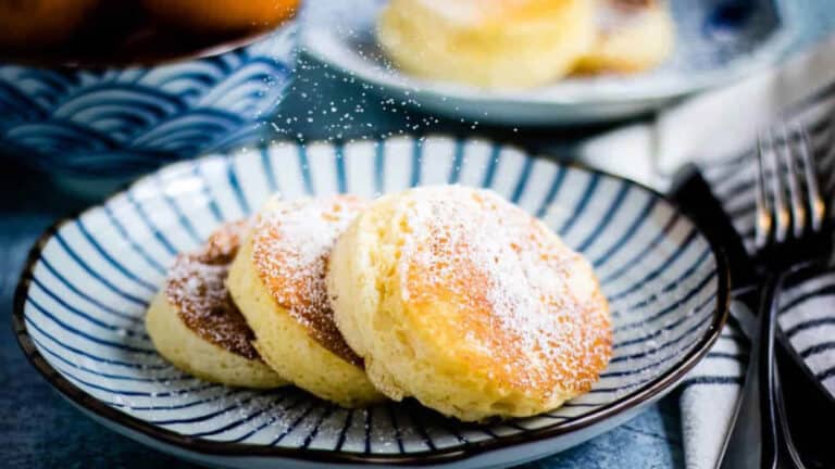 Japanese souffle pancakes with powdered sugar.