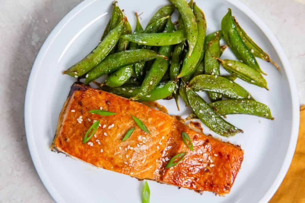 Air fryer frozen salmon with green bean.