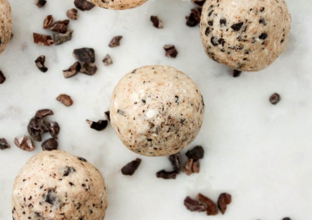 Close-up of homemade chocolate chip cookie dough fat bombs.