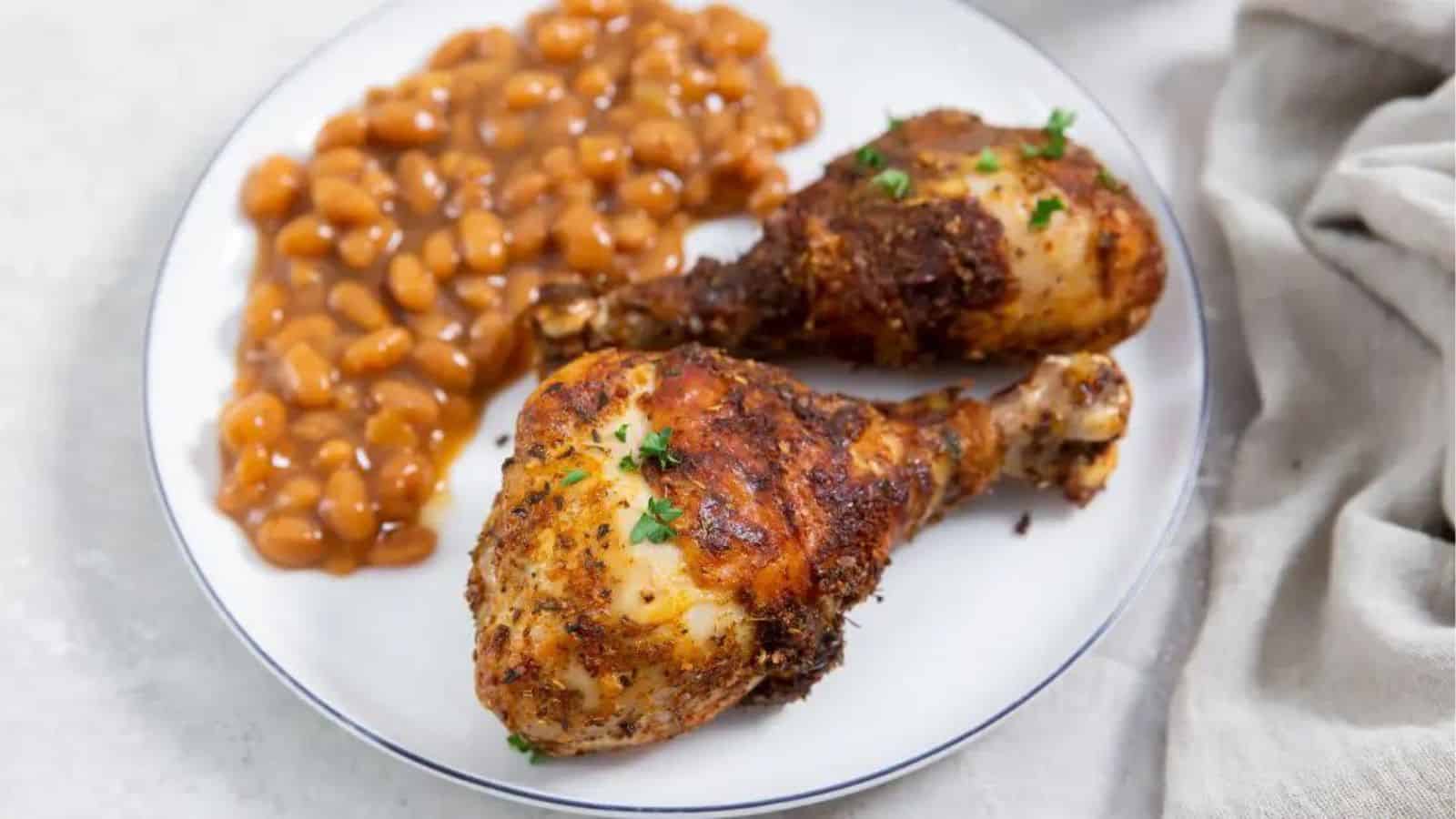 Easy Air Fryer Chicken Legs with Dry Rub on a white plate.