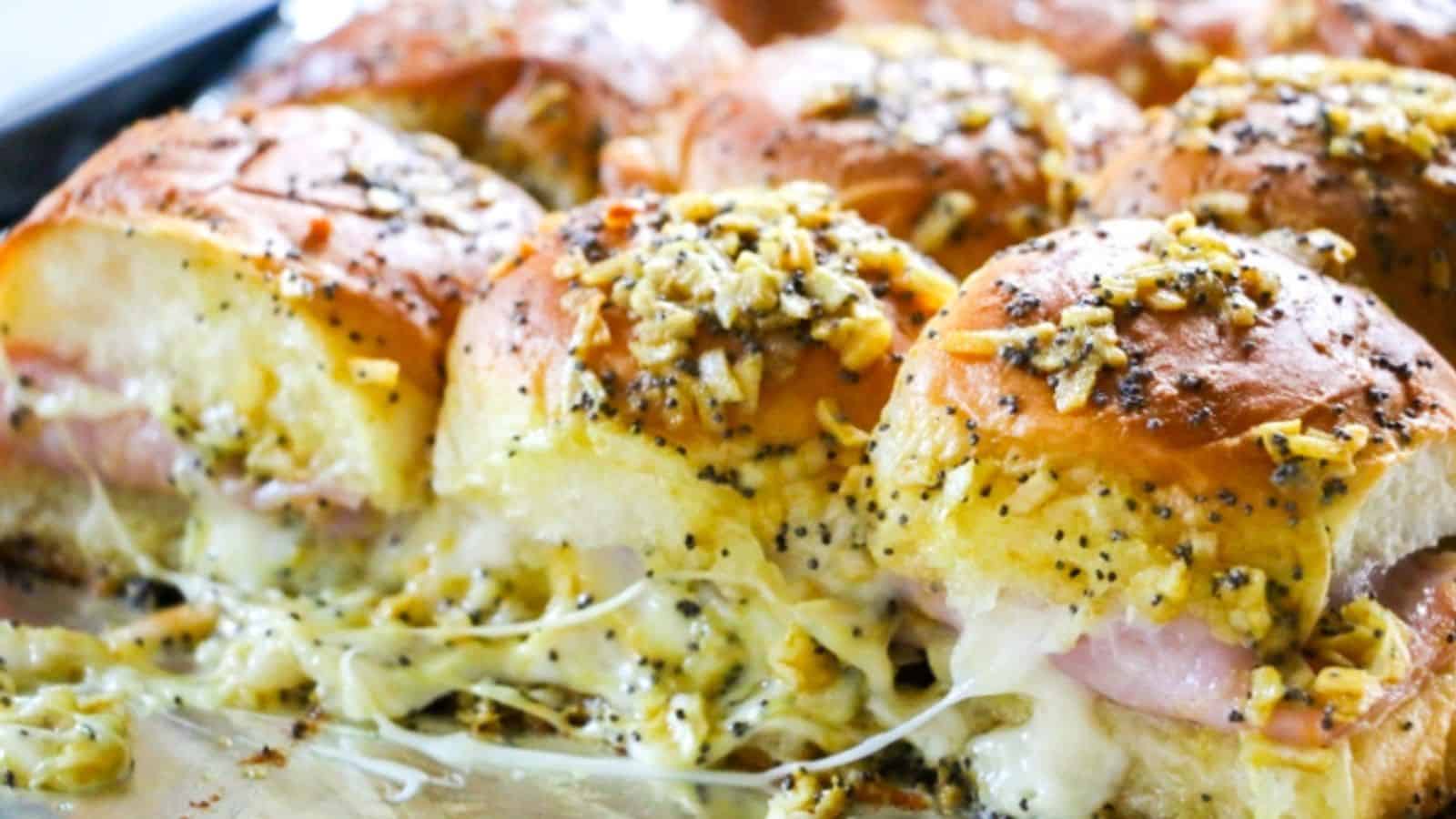 Easy Ham and Cheese Sliders with poppy seeds.