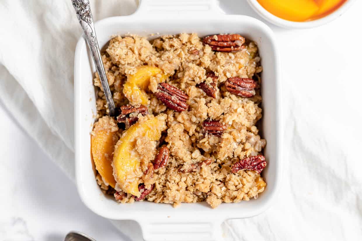 Peach crisp in a baking pan.