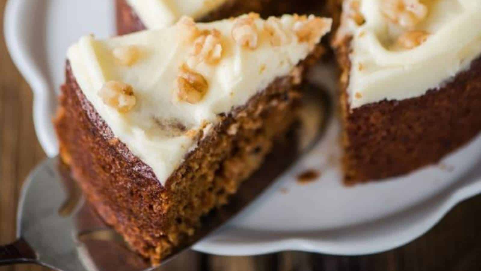 Keto Carrot Cake with frosting and nuts.